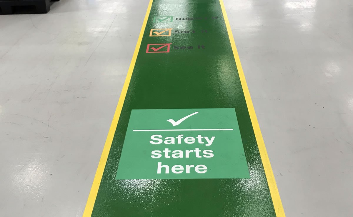 green demarcation in a factory