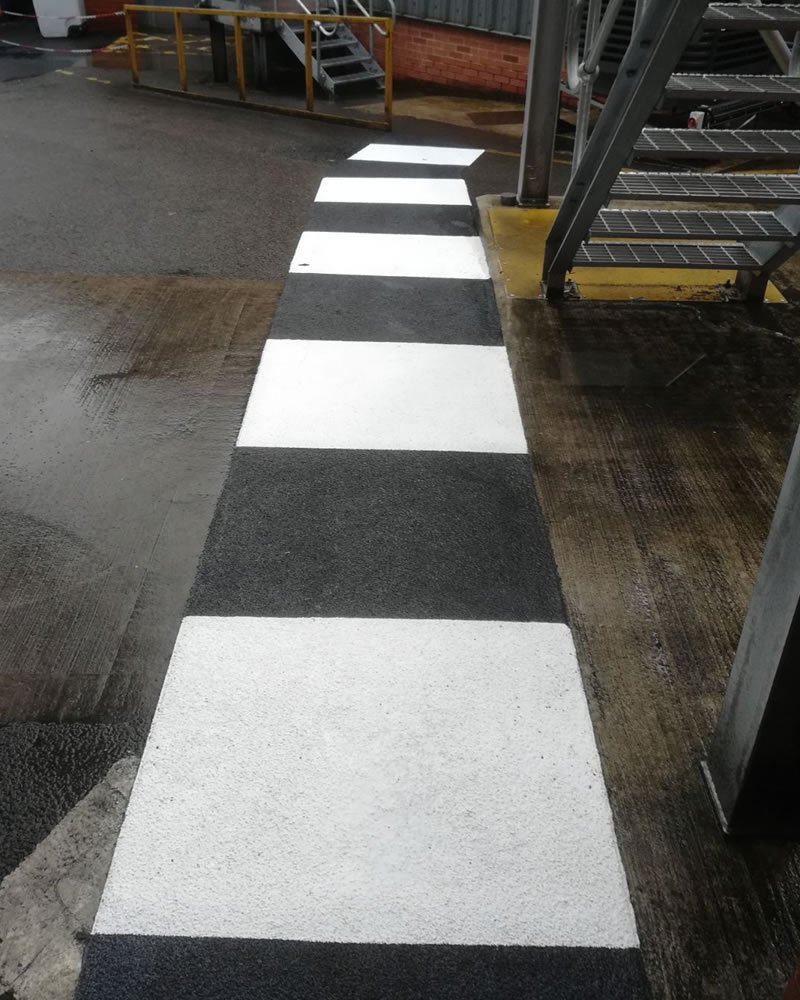 walkway in black and white outside using resin